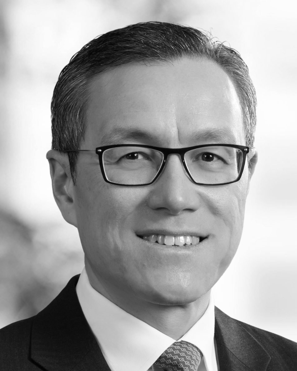 Black and white headshot of Baker McKenzie's Global Chair Milton Cheng