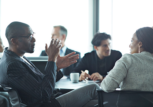 group of colleagues having a discussion