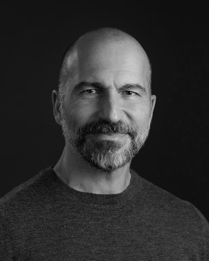 a black and white headshot of Dara Khosrowshahi