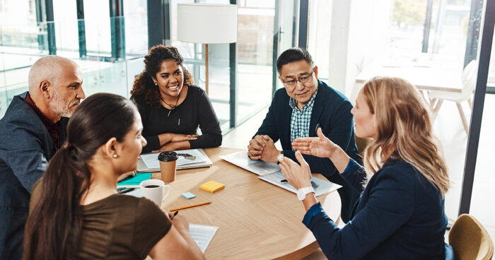 Shot of a group of businesspeople having a meeting in an office