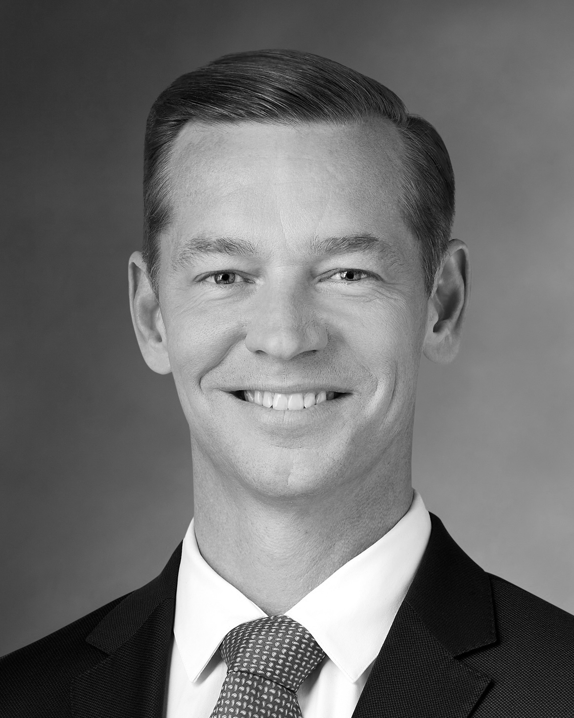 Black and white photo of Chris Kempczinski of McDonald's Corporation.