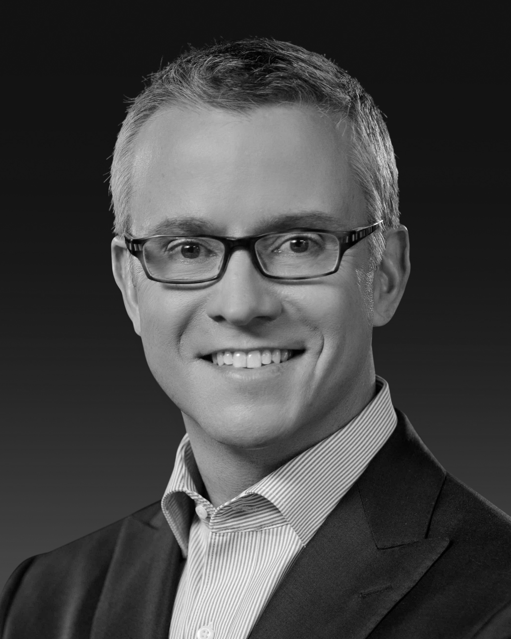 Black and white headshot of Jeffrey J. Jones II of H&R Block.