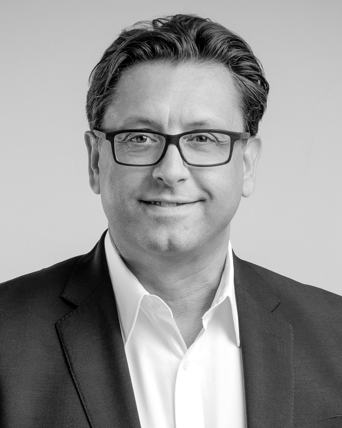 Paul Hudson headshot in greyscale